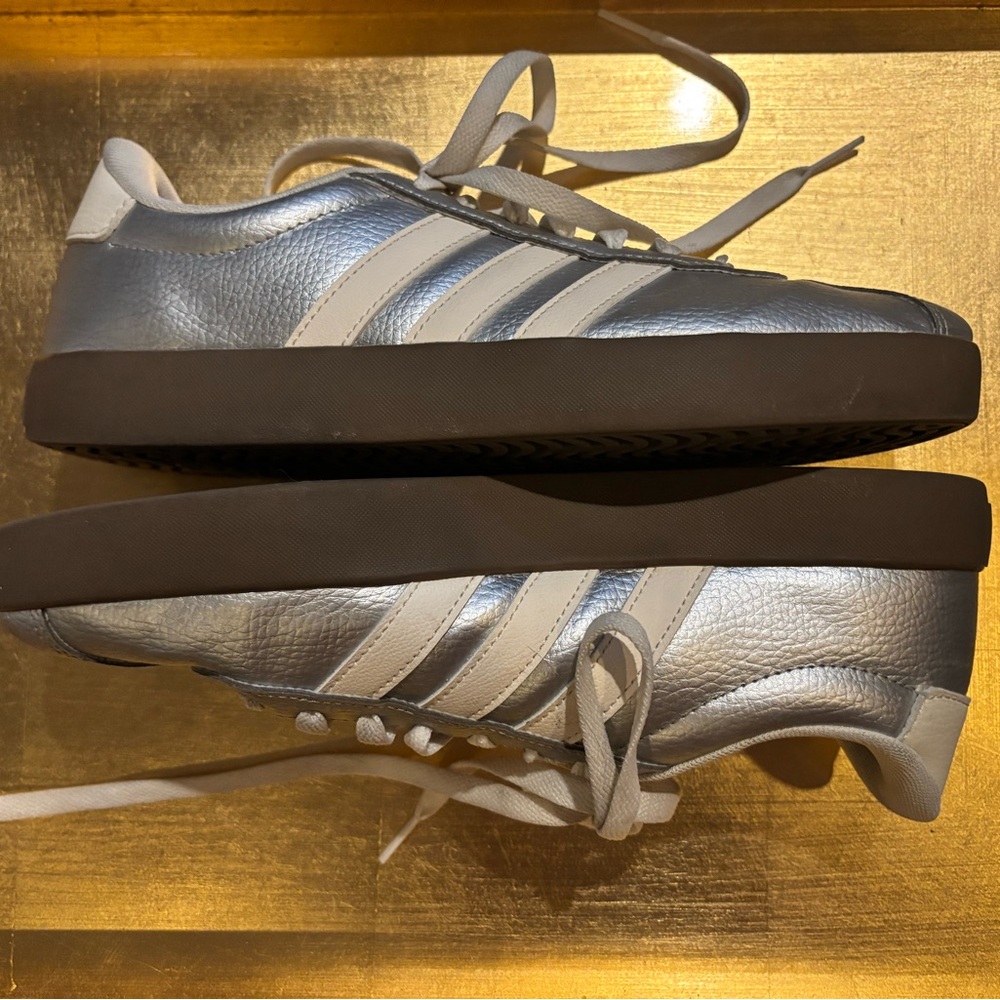 Adidas low profile silver sneakers